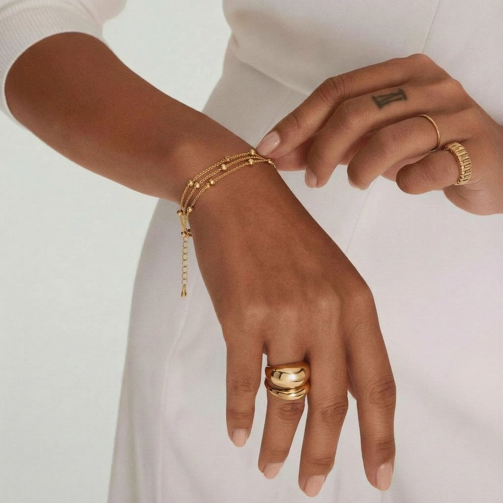 The Orbit Bracelet — Triple-Strand Gold Beaded Chain <span class="by">by Monarch & Marigold Co.</span>