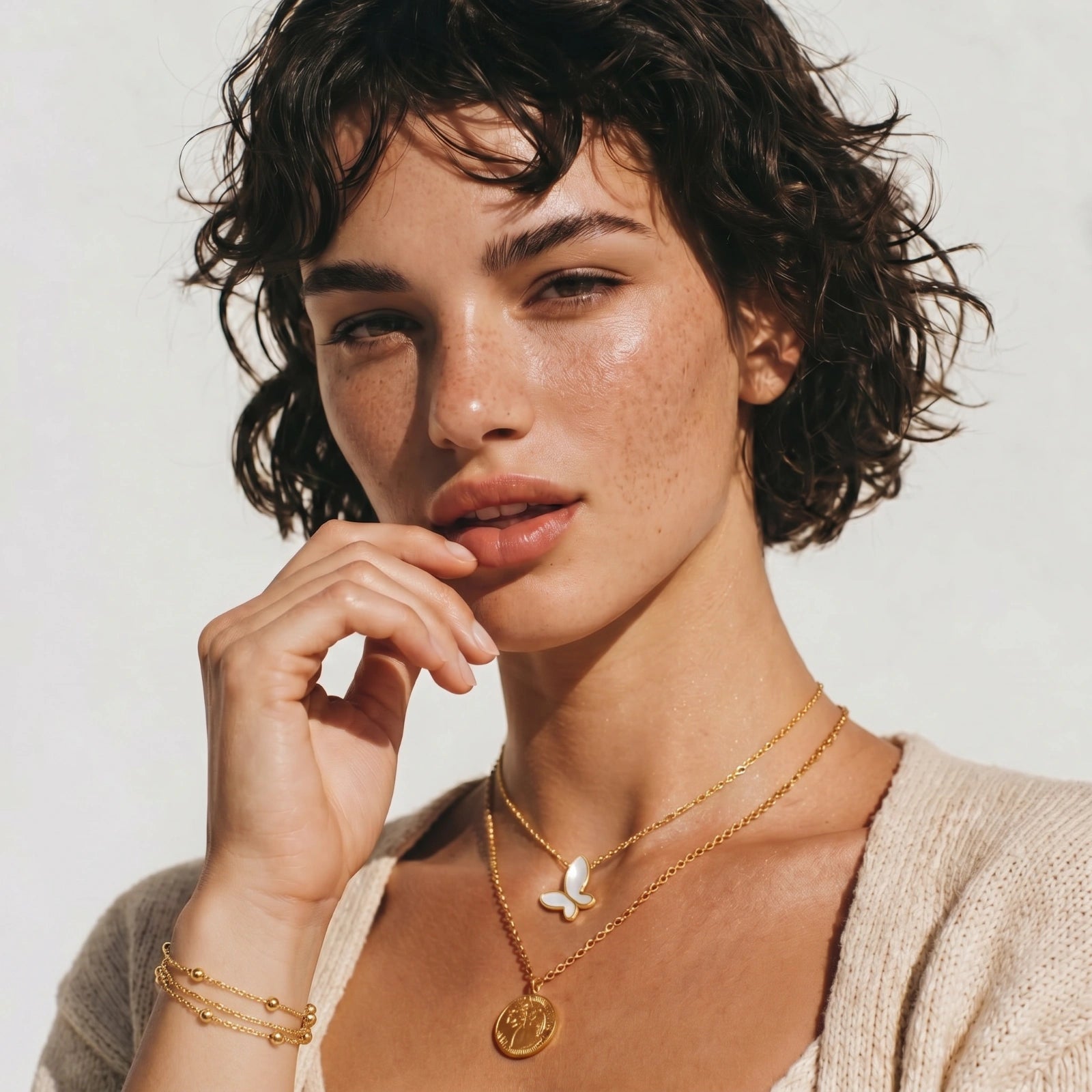 The Orbit Bracelet — Triple-Strand Gold Beaded Chain <span class="by">by Monarch & Marigold Co.</span>