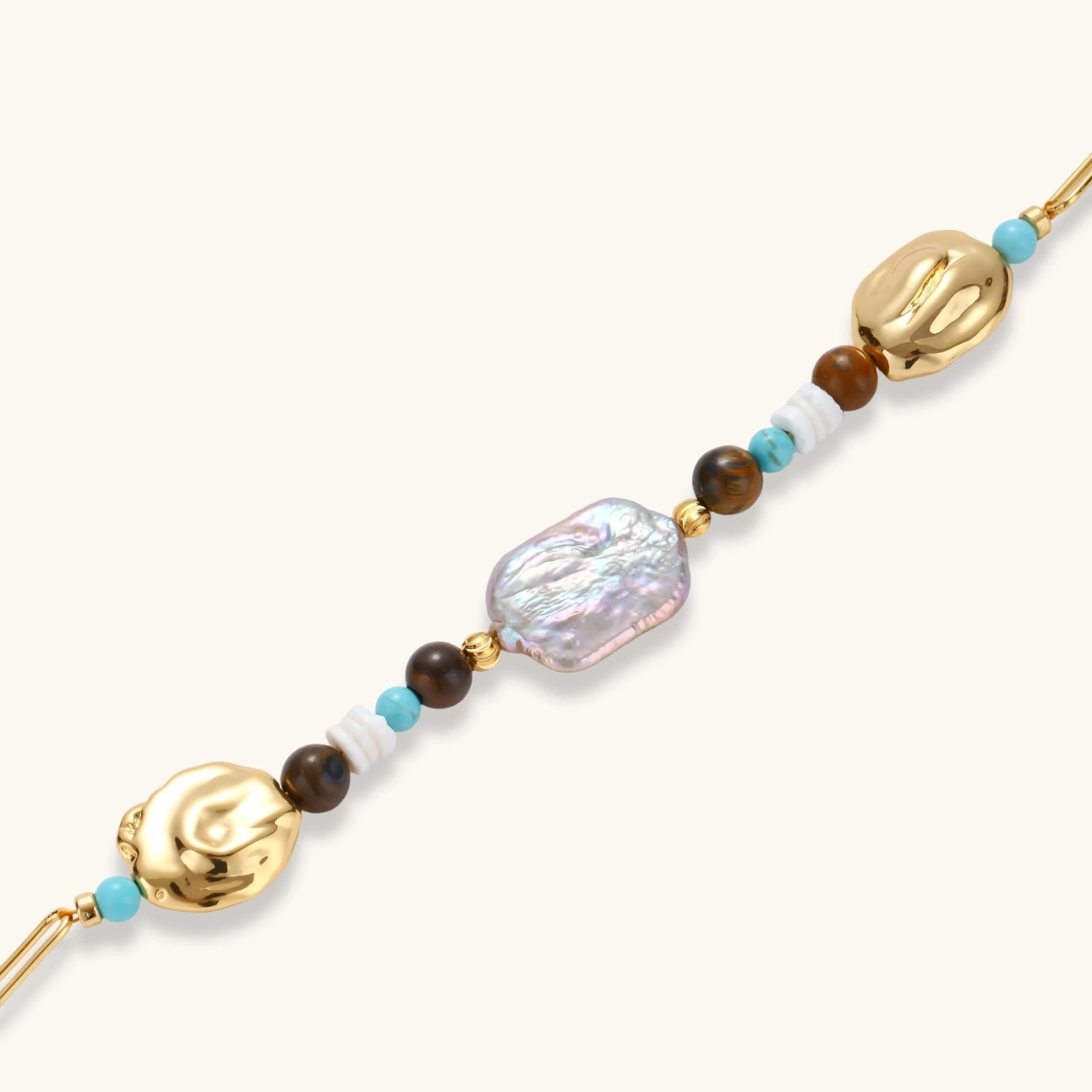 The Tideline Bracelet — Baroque Pearl, Turquoise & Tiger's Eye Bracelet <span class="by">by Monarch & Marigold Co.</span>.